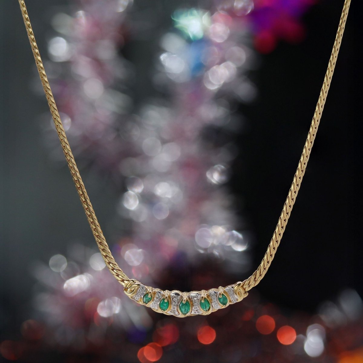 Collier maille gourmette en or jaune et émeraude - Castafiore