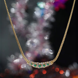 Collier maille gourmette en or jaune et émeraude - Castafiore