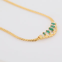 Collier maille gourmette en or jaune et émeraude - Castafiore