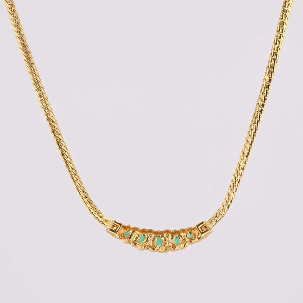 Collier maille gourmette en or jaune et émeraude - Castafiore