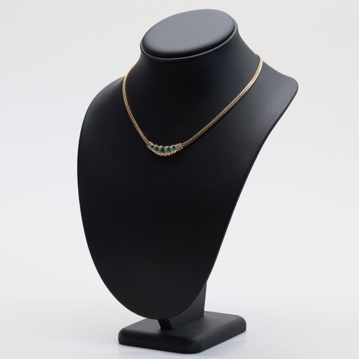 Collier maille gourmette en or jaune et émeraude - Castafiore