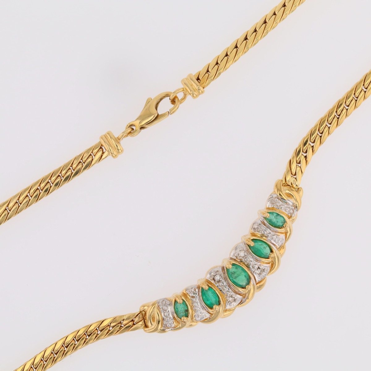 Collier maille gourmette en or jaune et émeraude - Castafiore