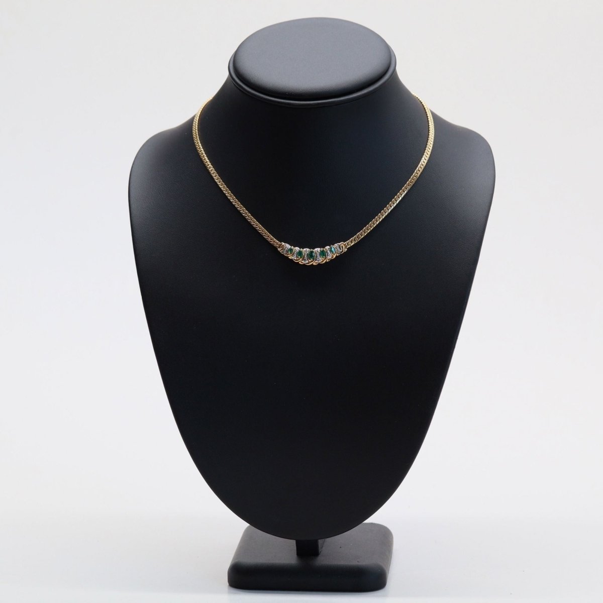 Collier maille gourmette en or jaune et émeraude - Castafiore