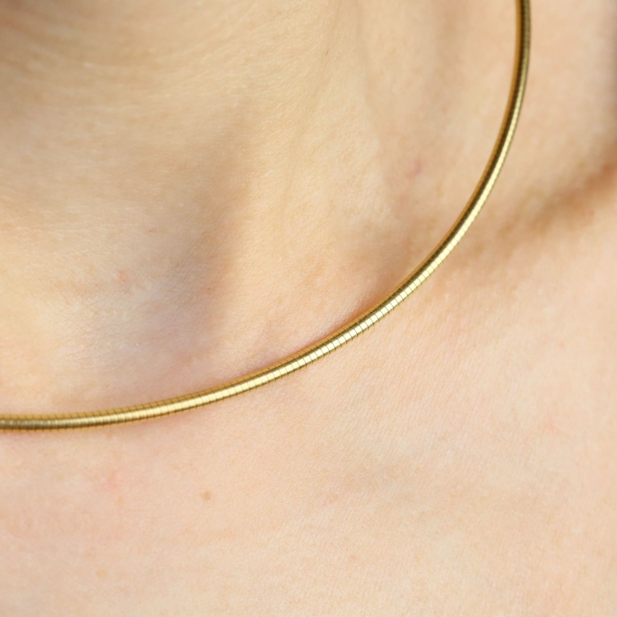 Collier maille oméga en or jaune - Castafiore