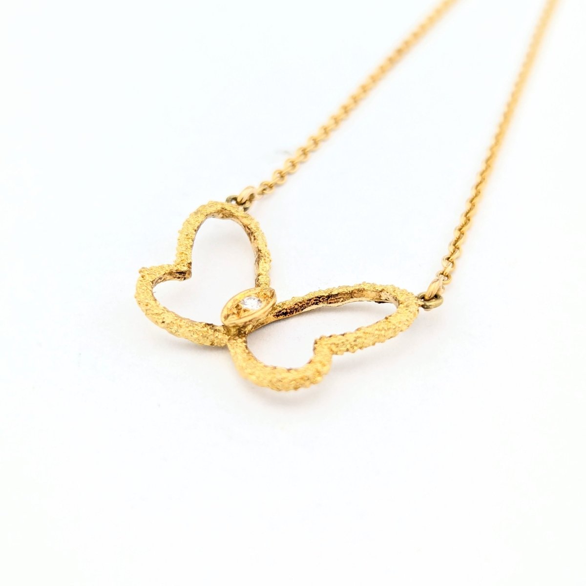 Collier papillon en or jaune et diamant
