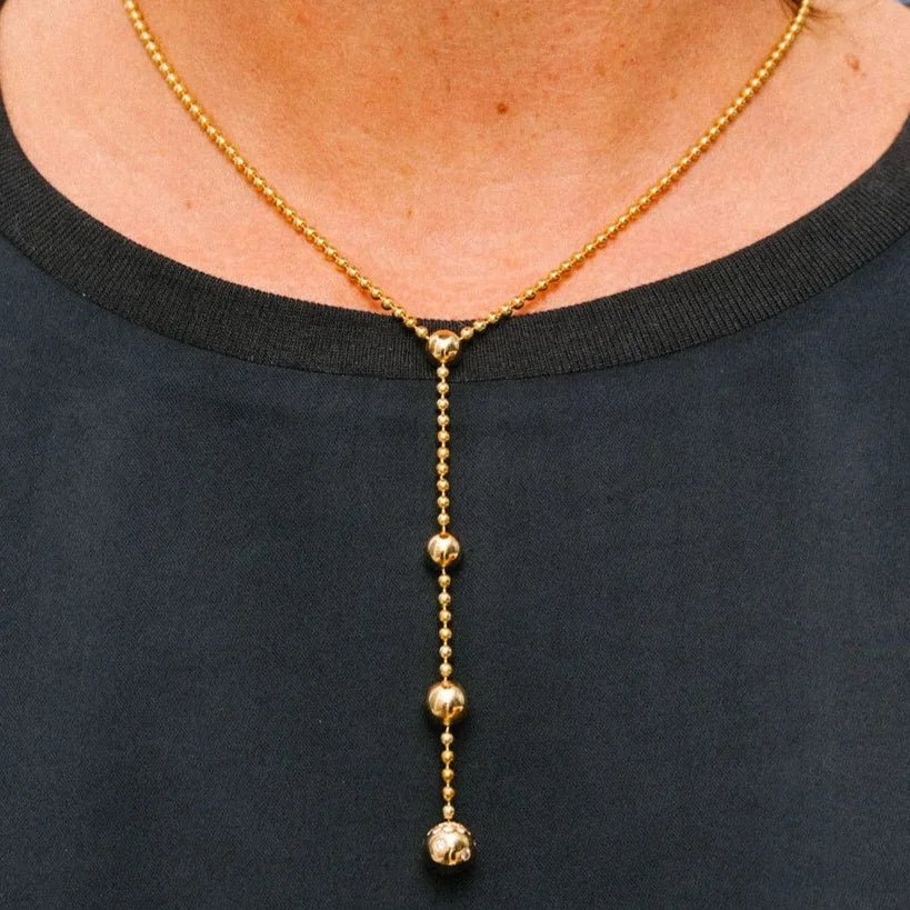 Collier Pendentif CARTIER "Draperie de décolleté" en or jaune et diamants - Castafiore