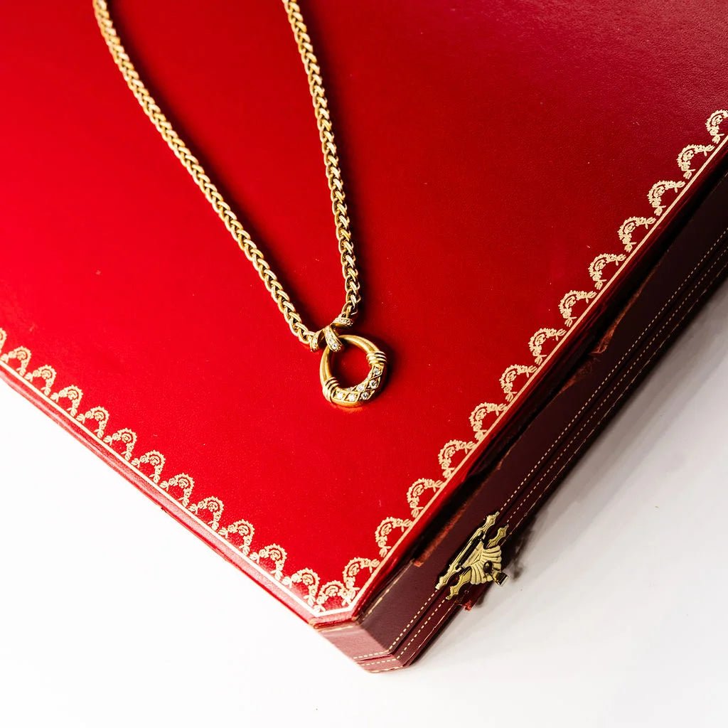 Collier Pendentif CARTIER en or jaune, or rose, or blanc et diamants - Castafiore