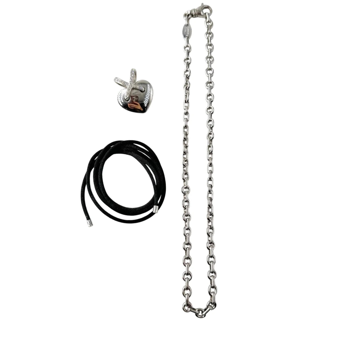 Collier Pendentif CHAUMET "Coeur Liens" en or blanc et diamants - Castafiore