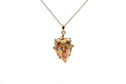 Collier pendentif Chaumet turquoises et rubis en or 18k - Castafiore