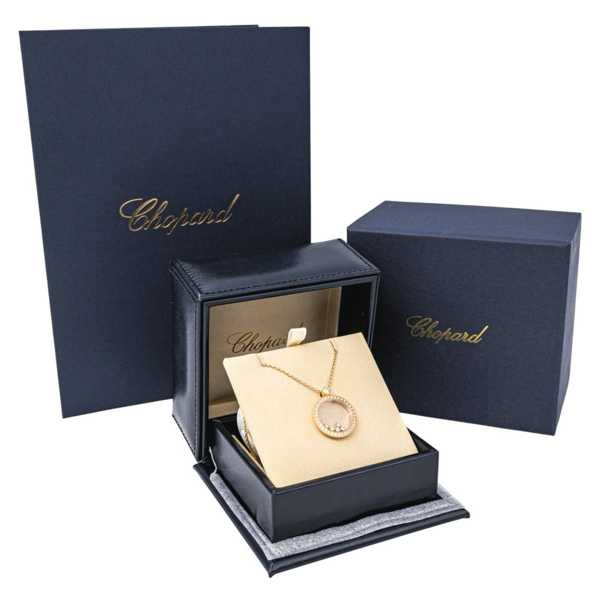 Collier Pendentif CHOPARD "Happy Diamonds Icons" en or rose, saphir et diamants - Castafiore