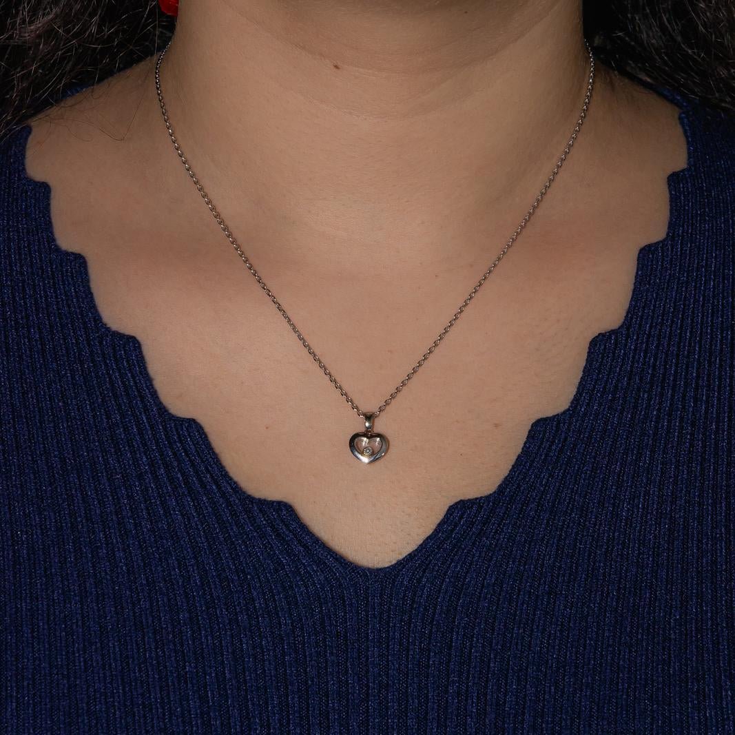 Collier Pendentif CHOPARD "Happy Heart" en or blanc et diamant - Castafiore
