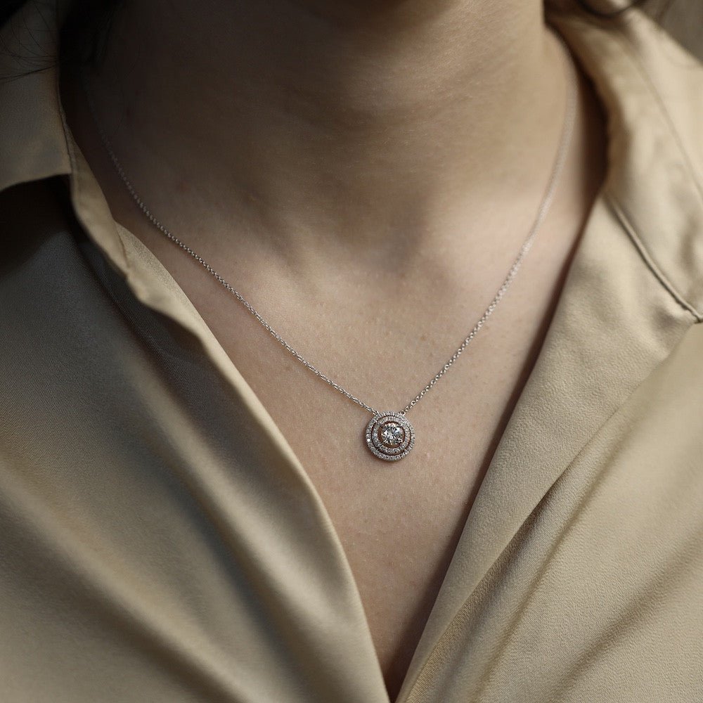 Collier pendentif diamant 0,60 Ct E - SI2 en or gris 18 Cts. Certifié HRD. - Castafiore