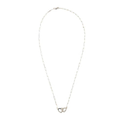 Collier Pendentif DINH VAN "Menottes Double Coeurs R9" en or blanc et diamants - Castafiore