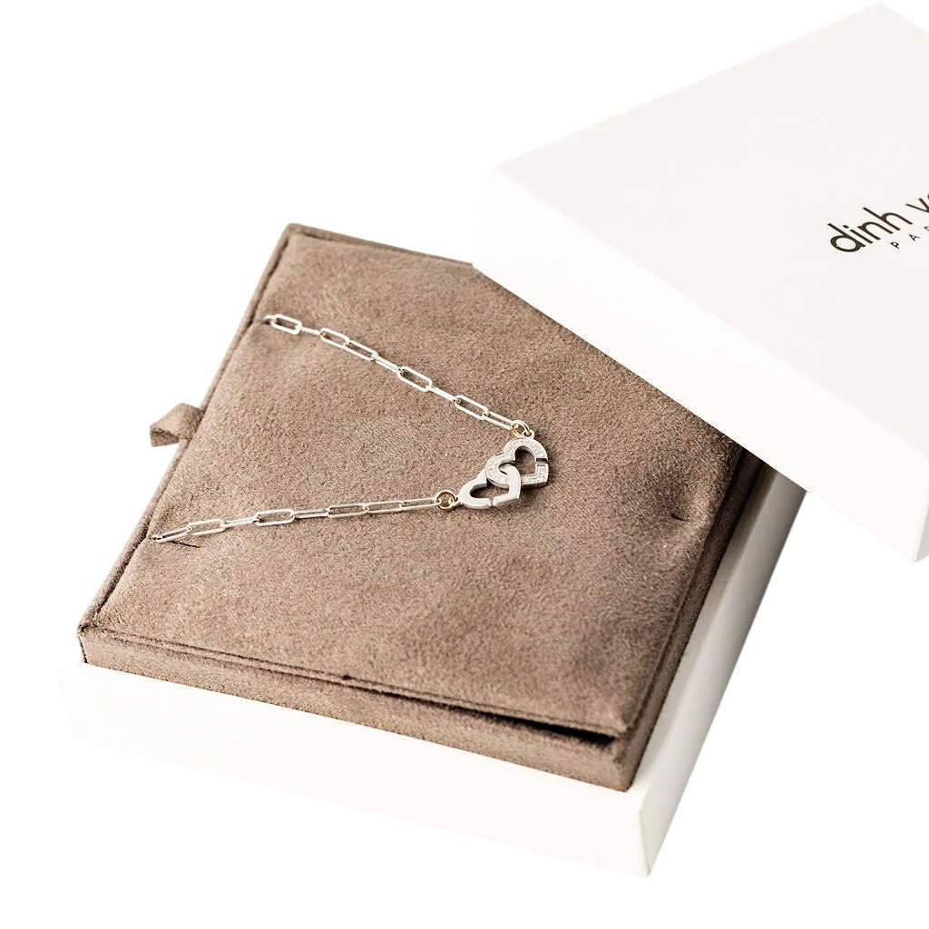 Collier Pendentif DINH VAN "Menottes Double Coeurs R9" en or blanc et diamants - Castafiore