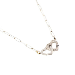 Collier Pendentif DINH VAN "Menottes Double Coeurs R9" en or blanc et diamants - Castafiore