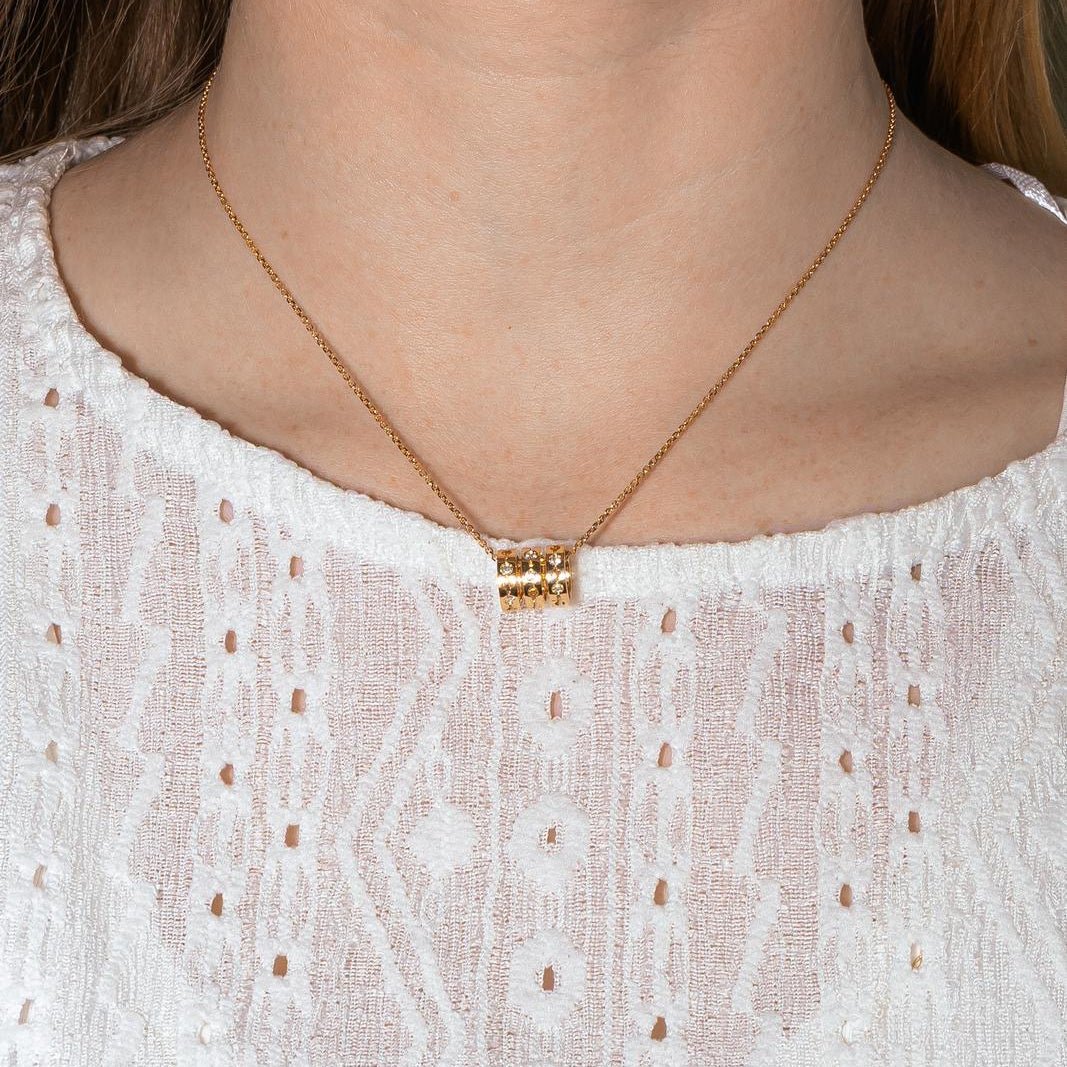 Collier Pendentif DINH VAN "Pulse" en or jaune et diamants - Castafiore