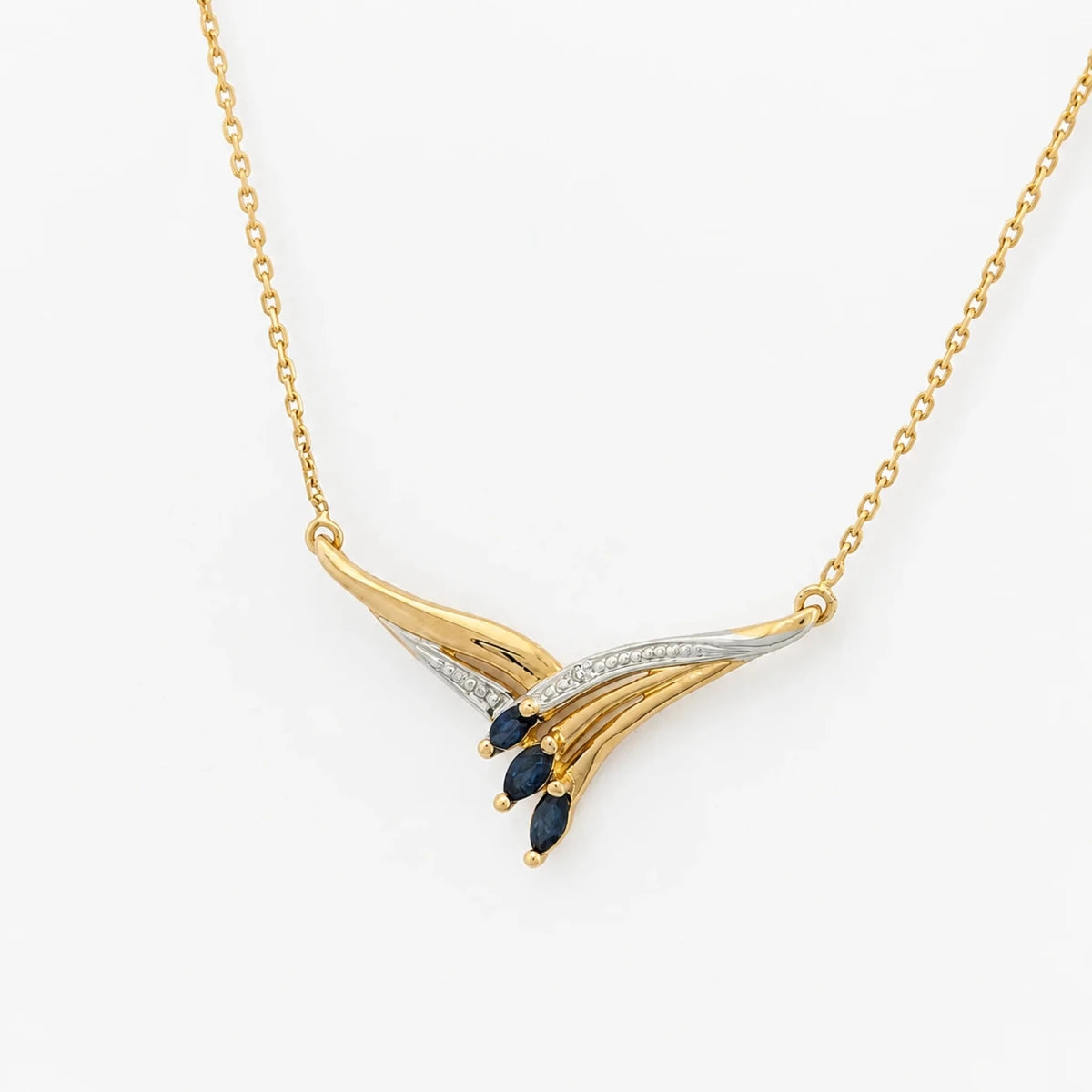 Collier Pendentif en or blanc, or jaune, saphirs et diamant - Castafiore