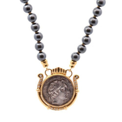 Collier pendentif en or et pièce de monnaie ancienne - Castafiore