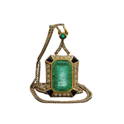 Collier Pendentif en or jaune, or blanc, platine, émeraude, onyx et diamants - Castafiore