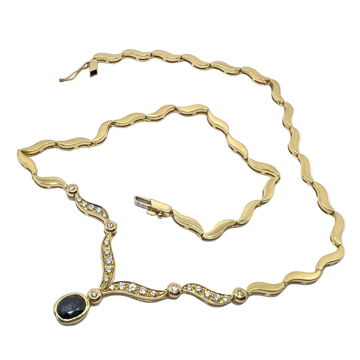 Collier Pendentif en or jaune, saphir et diamants - Castafiore