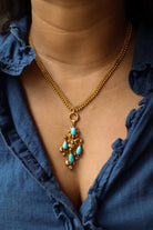 Collier Pendentif en or jaune, turquoise, et diamants - Castafiore