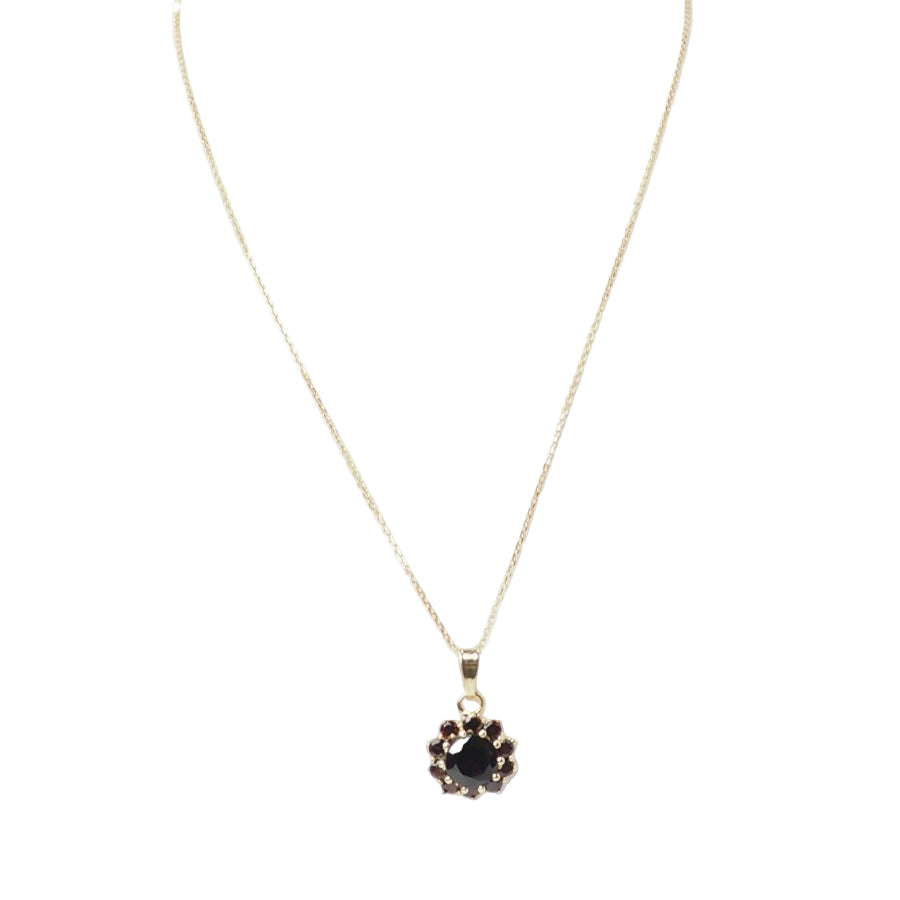 Collier pendentif marguerite en or jaune et grenats - Castafiore