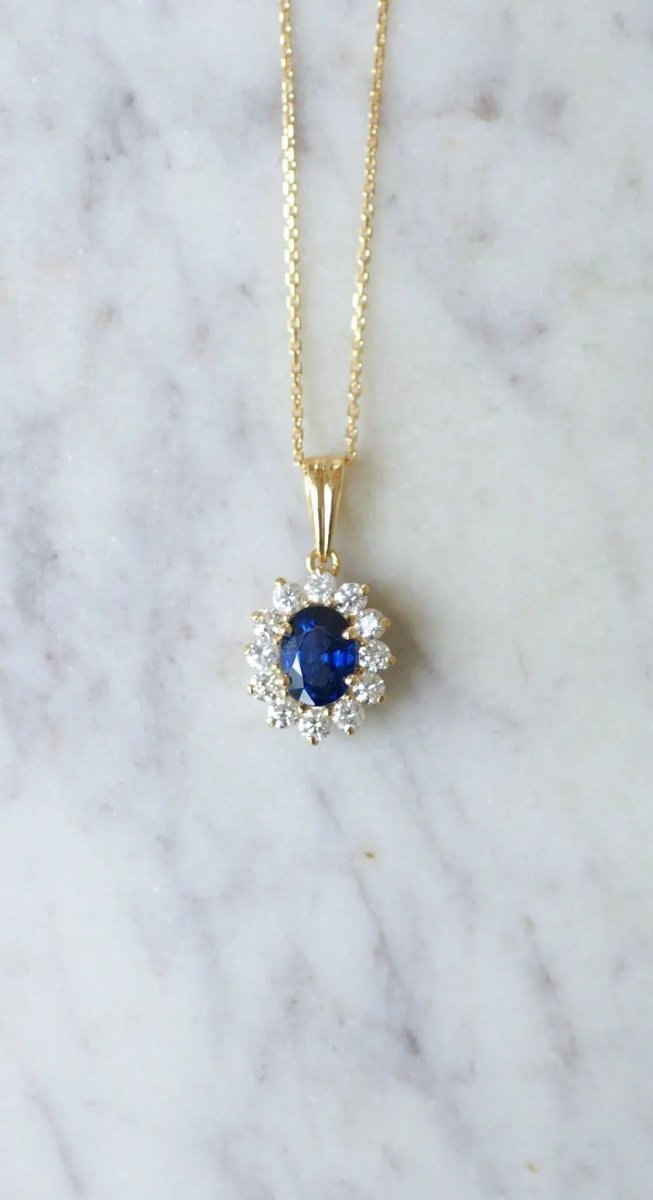 Collier pendentif marguerite saphir et diamants - Castafiore