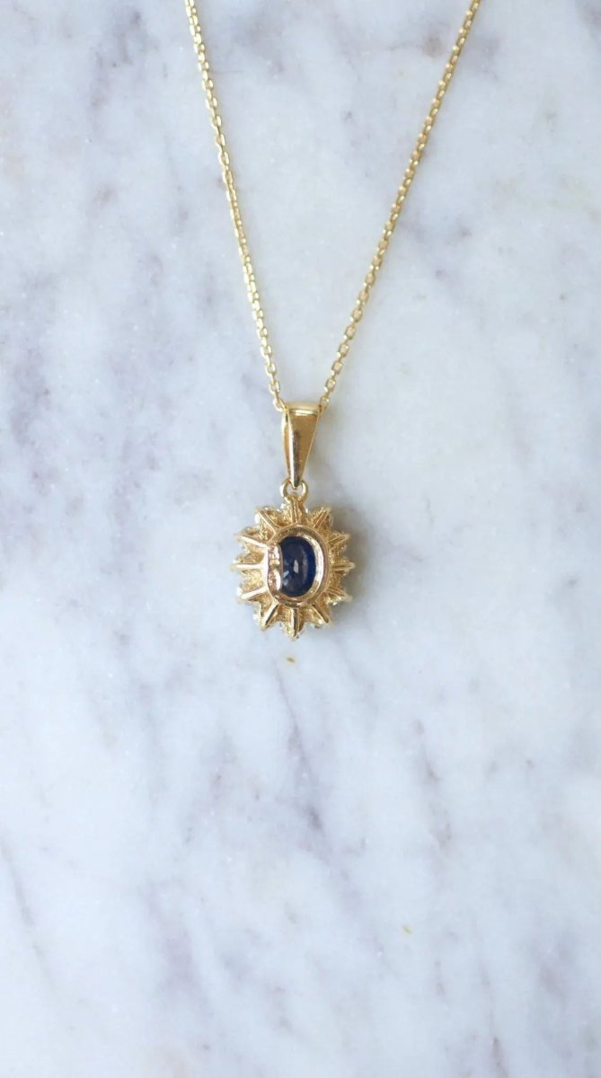 Collier pendentif marguerite saphir et diamants - Castafiore