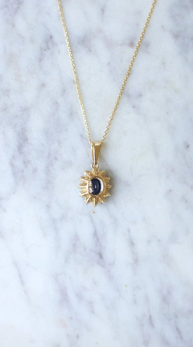 Collier pendentif marguerite saphir et diamants - Castafiore