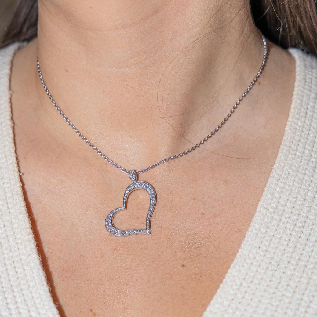 Collier Pendentif PIAGET "Cœur" en or blanc et diamants - Castafiore
