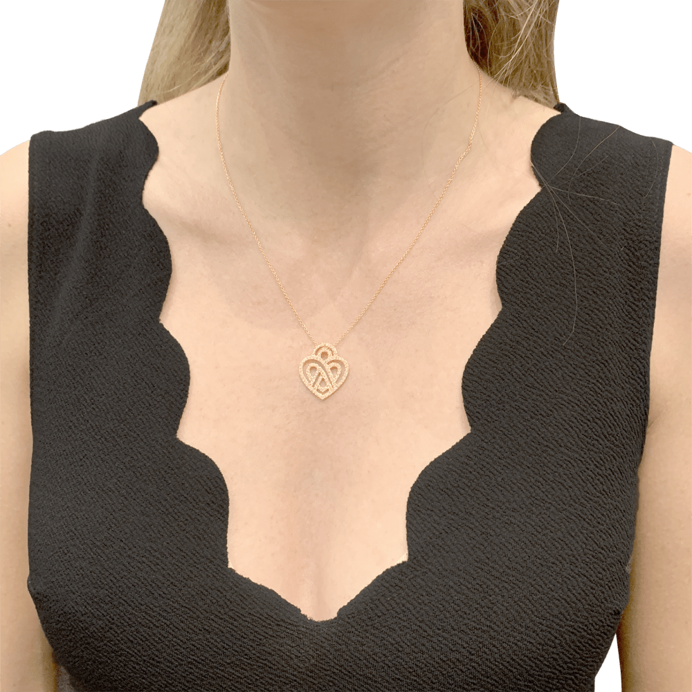 Collier Pendentif POIRAY "Coeur Entrelacé" en or rose et diamants - Castafiore