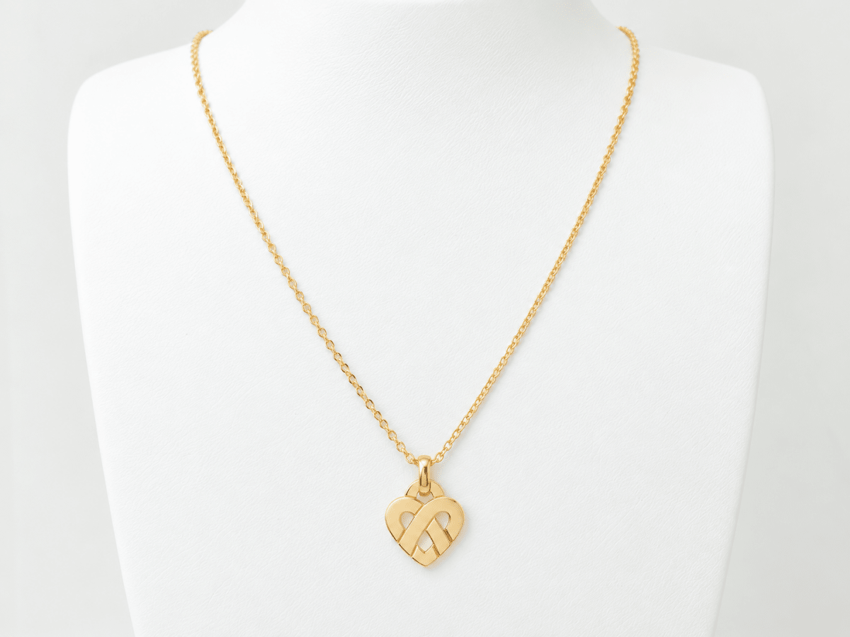 Collier Pendentif POIRAY "Entrelacé" PM en or jaune - Castafiore
