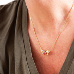 Collier Pendentif VAN CLEEF & ARPELS Papillon en or jaune, rubis et diamants - Castafiore