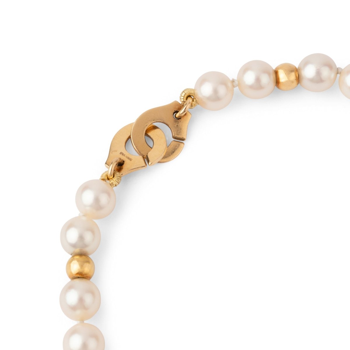 Collier perles Akoya et boule d'or fermoir menottes de la maison Dinh Van - Castafiore