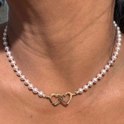 Collier Perles DINH VAN "Menottes Double Coeur" en or jaune - Castafiore