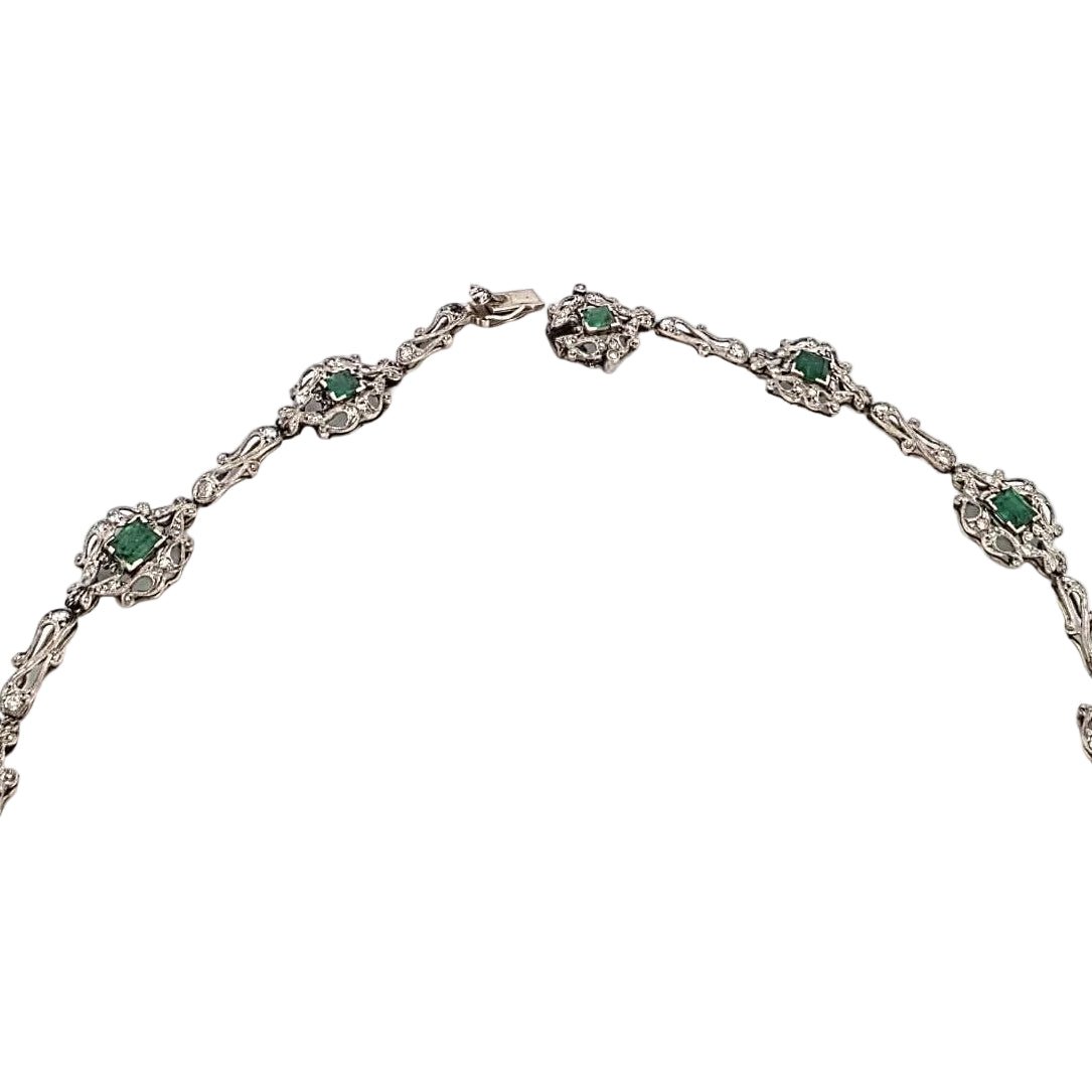 Collier Plastron en platine, émeraudes et diamants - Castafiore