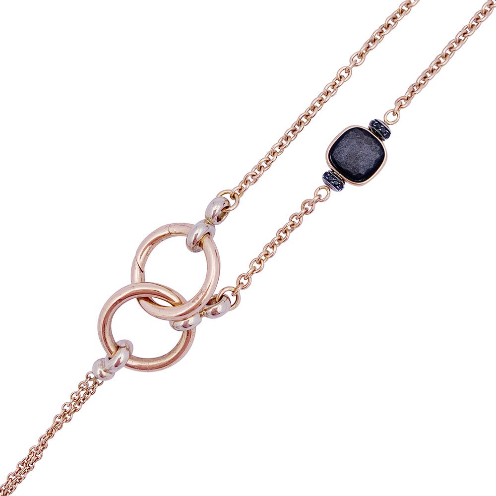 Collier Pomellato, "Nudo", or rose, obsidiennes, diamants noirs. - Castafiore