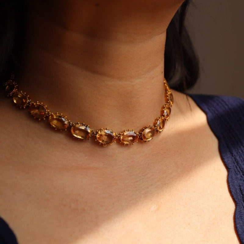 Collier Ras de cou et Broche Clip en or jaune et topaze - Castafiore