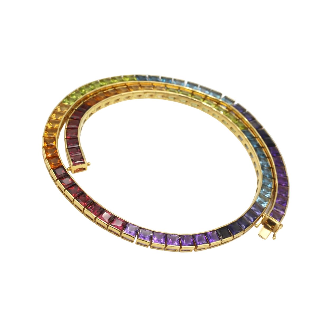 Collier Ras de Cou HANS STERN "Rainbow" en or jaune, grenats, citrines, péridots, aigues - marines, cordiérites et améthystes - Castafiore