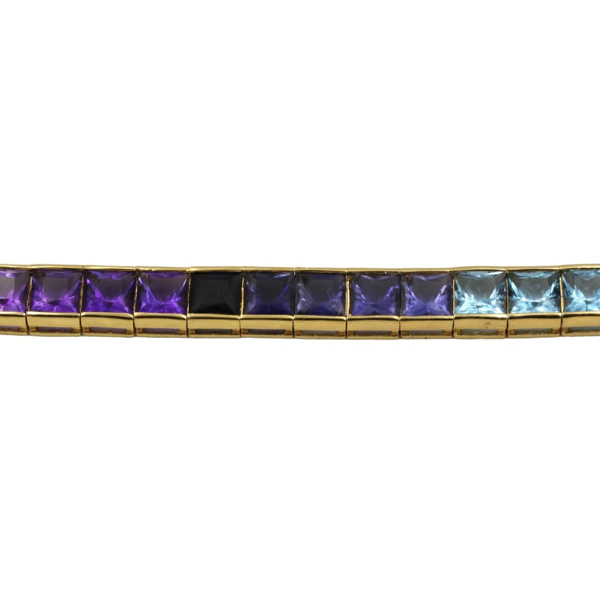 Collier Ras de Cou HANS STERN "Rainbow" en or jaune, grenats, citrines, péridots, aigues - marines, cordiérites et améthystes - Castafiore