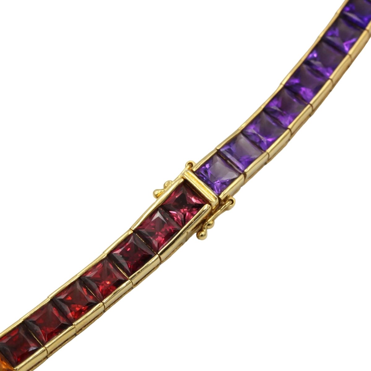Collier Ras de Cou HANS STERN "Rainbow" en or jaune, grenats, citrines, péridots, aigues - marines, cordiérites et améthystes - Castafiore