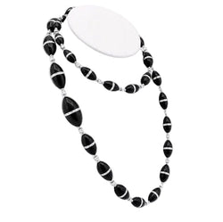 Collier R.CAMPELL en platine, onyx et diamants - Castafiore