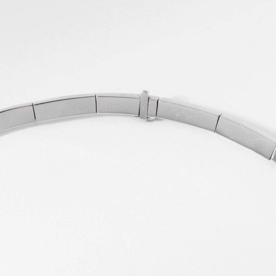 Collier rigide or gris de la maison Chaumet - Castafiore