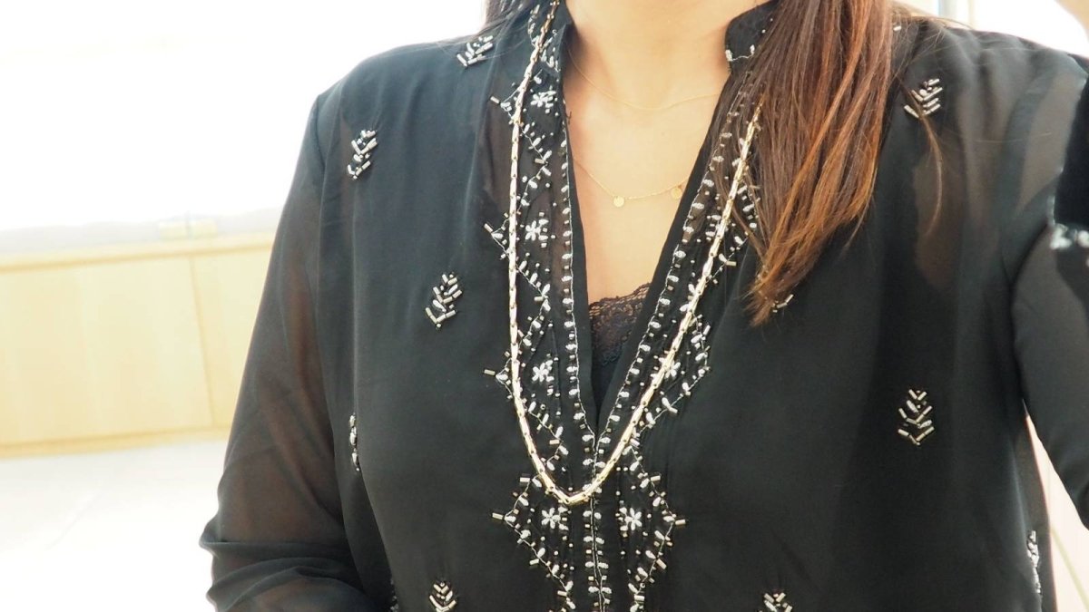 Collier Sautoir Cartier en or jaune grain d' avoine - Castafiore