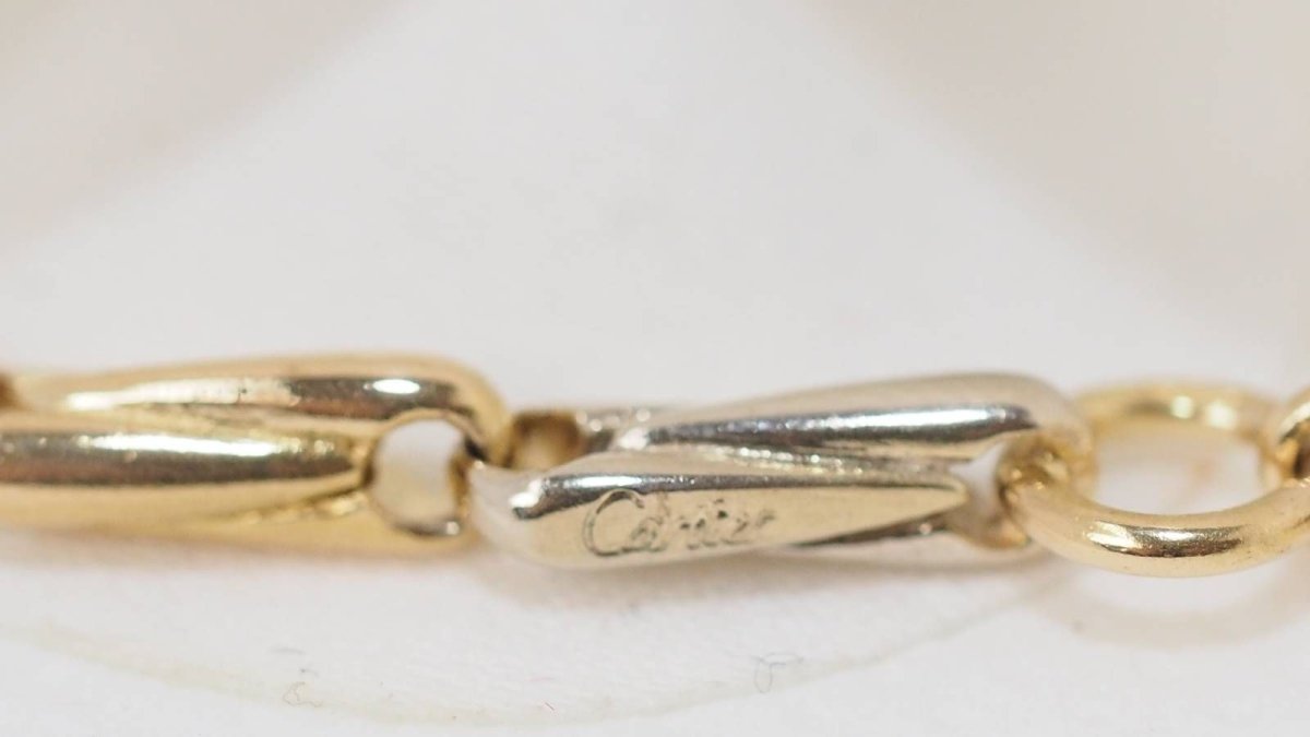 Collier Sautoir Cartier en or jaune grain d' avoine - Castafiore