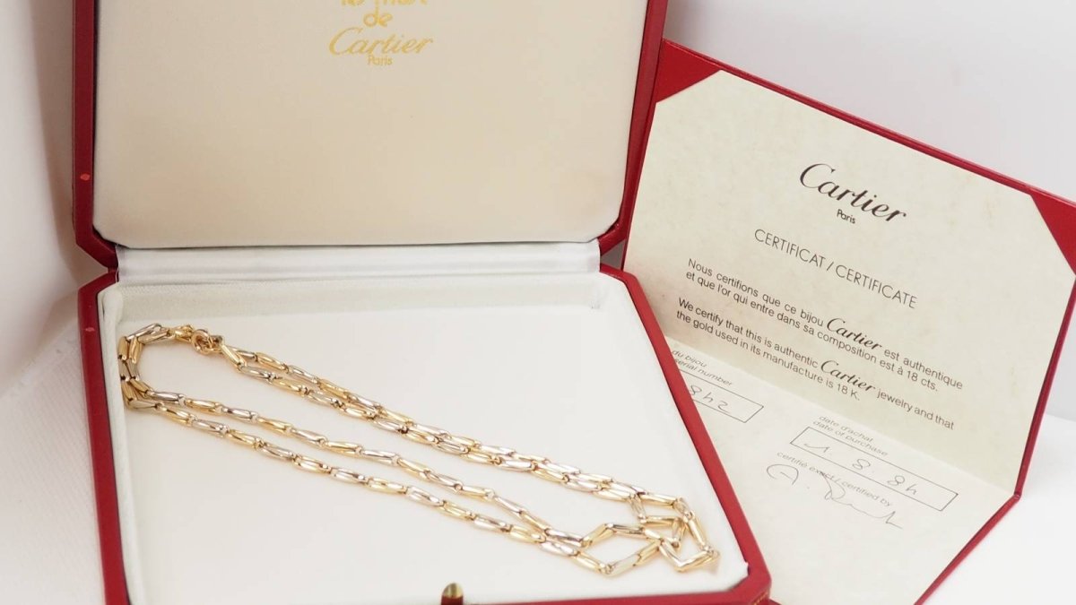 Collier Sautoir Cartier en or jaune grain d' avoine - Castafiore