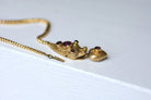 Collier serpent ancien en or jaune et grenat - Castafiore