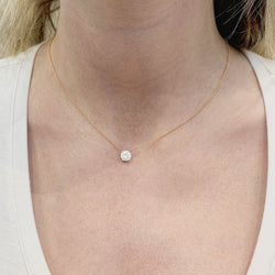 Collier solitaire deux ors, diamants. - Castafiore