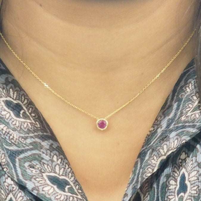 Collier solitaire en or jaune et rubis - Castafiore