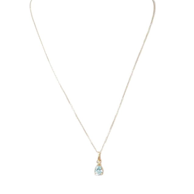 Collier solitaire en or jaune et topaze bleue - Castafiore